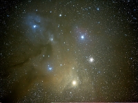 080505 RhoOph 40x3 cs temp  The Rho Ophiuchi Cloud complex in the constellation Ophiucus.  The cloud complex include dark clouds of dust, blue reflection nebulae and red emision nebulae. The globular cluster M4 is behind this complex. Image Details: Date: 5/5/2008 Location: New Mexico Skies, NM Mount: Astrotrac I Camera: Canon 40D Optics: Canon 70-200 2.8L @ 200 mm Exposure: 40 x 120 sec Processing: Photoshop CS