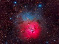 20140815 M20 LRGB 5x300secs  At 5200 light years away in the constellation of Sagittarius lies NGC 6514, The Trifid Nebula also known as M20.  This image is composed of 30 minutes each of Luminance, Red, Green and Blue and it clearly shows the dual nature of this object; the red Hydrogen II emission nebula in the lower region and the bright blue reflection nebula in the upper region.  In addition the dark nebula that gives the nebula its name is clearly evident. Image Details: Date:8/15/14 Location: Hutville, OH Mount: Paramount ME Camera: Apogee CG16M Optics: Planewave CDK-17 Exposure: L=R=G=B = 6x300 secs Processing: PixInsight